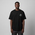 Model wearing black chest emblem tee