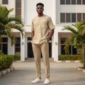 Model wearing khaki embroidered-pocket senator set