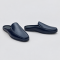 Men's navy blue pebble grain backless mule slippers, front and side view