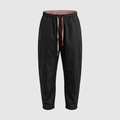 Black trousers with pink drawstring detail, ghost mannequin view