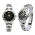 All-silver Greek key bracelet watch with black dial, front and side view on white background