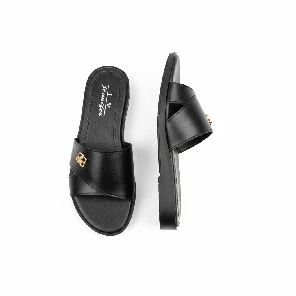 Women's black flat slide sandal with gold charm – ghost mannequin pair front and side view