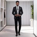 Nigerian male model wearing black pinstripe 3-piece suit with grey waistcoat