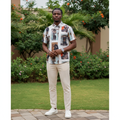 Nigerian male model wearing white equestrian collage print short-sleeve shirt