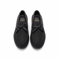 Berluti Paris all-black perforated tassel loafer ghost mannequin product shot, plain white background