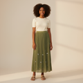 Nigerian girl wearing olive green bow pleated midi skirt - front view