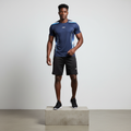 Nigerian male model wearing navy blue and black sports jersey set