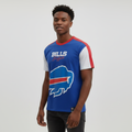 Young Nigerian male wearing royal blue Bills Buffalo colorblock graphic crew neck tee