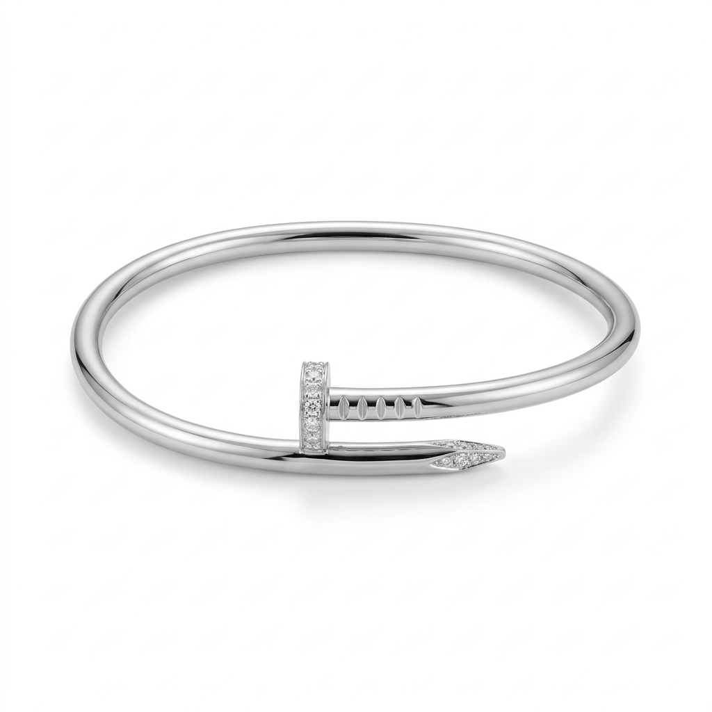 Silver-colour geometric-detail nail bracelet with stone accents on white