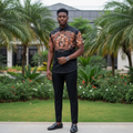 Nigerian male model wearing black nautical ship wheel graphic short-sleeve shirt