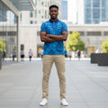 Young Nigerian male model wearing blue ocean wave abstract print polo shirt
