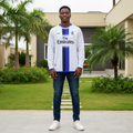 White and navy centre stripe long-sleeve retro football jersey — Nigerian male model front view
