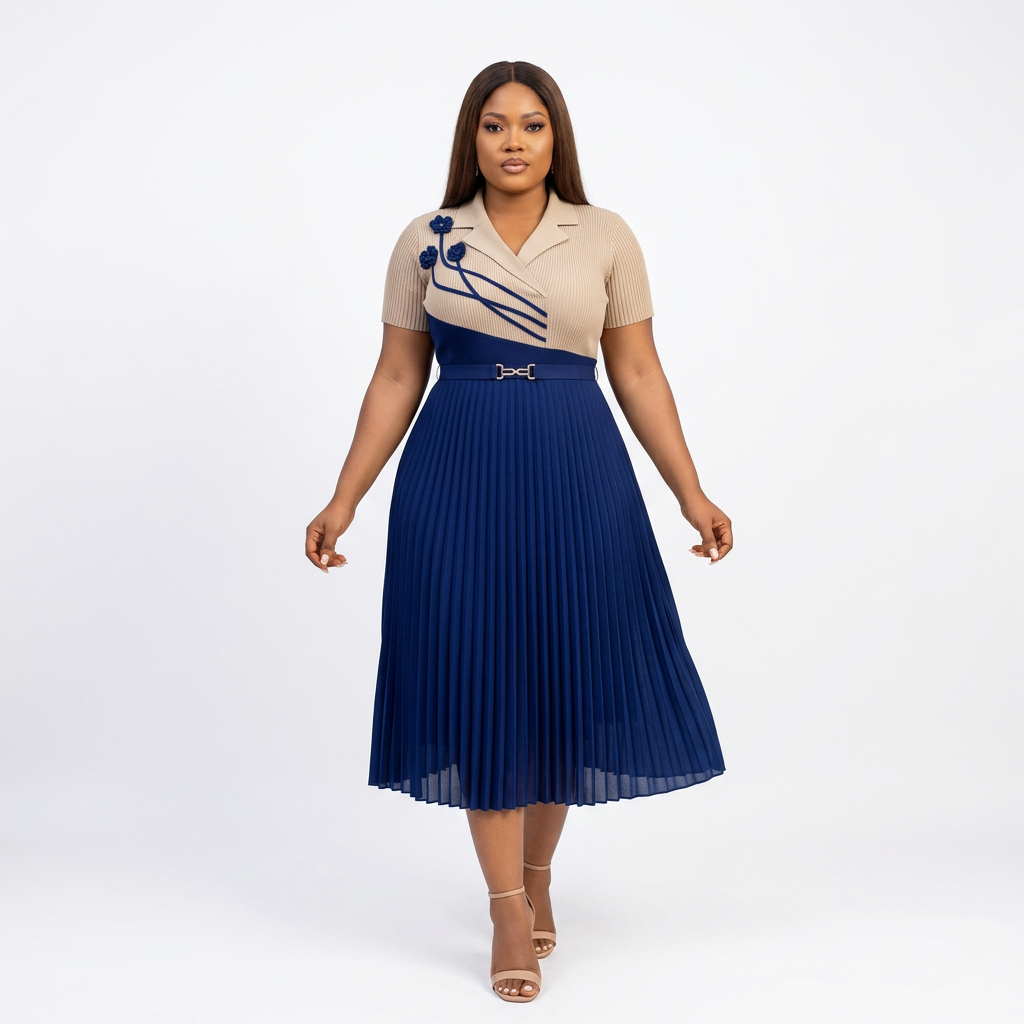 Woman wearing beige and navy floral-accent pleated midi dress on a plain white background