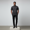 Nigerian male model wearing black floral print short-sleeved shirt