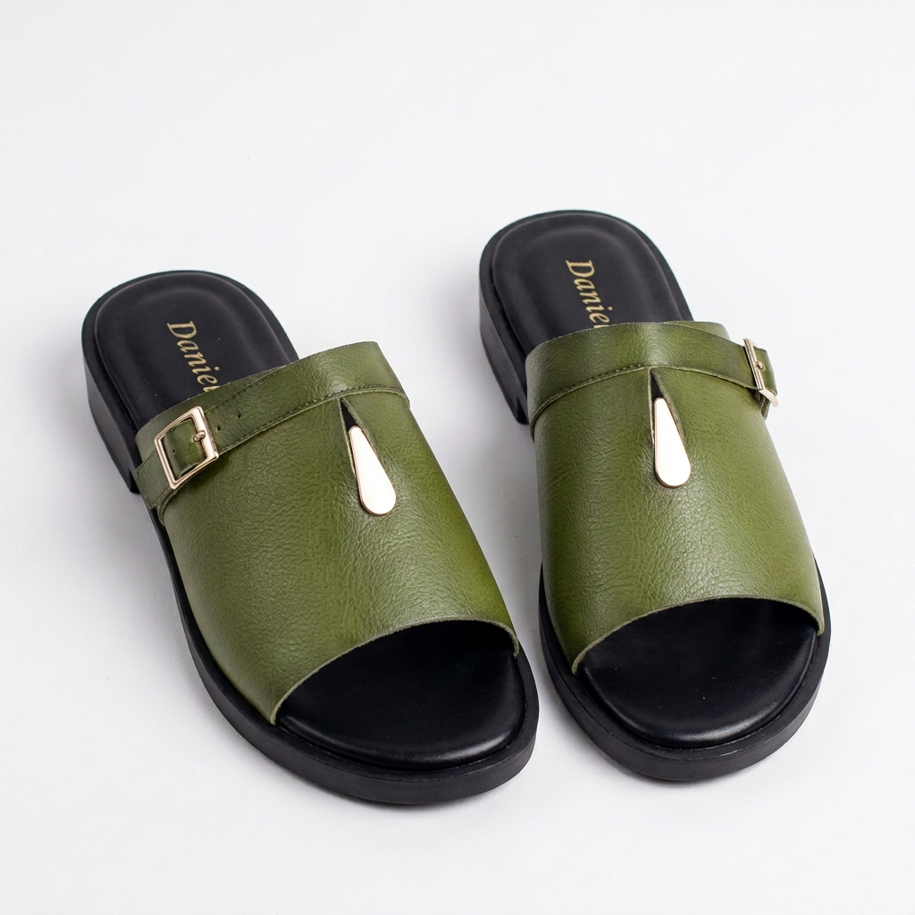 Pair of olive-green buckle-detail slides with black soles on white