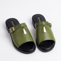 Pair of olive-green buckle-detail slides with black soles on white
