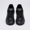 Black and silver mesh lace-up sneaker pair on a light grey background