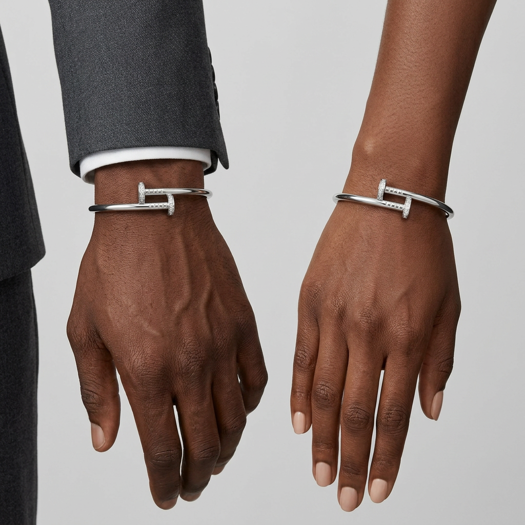 Silver-tone nail bracelet on male and female wrists
