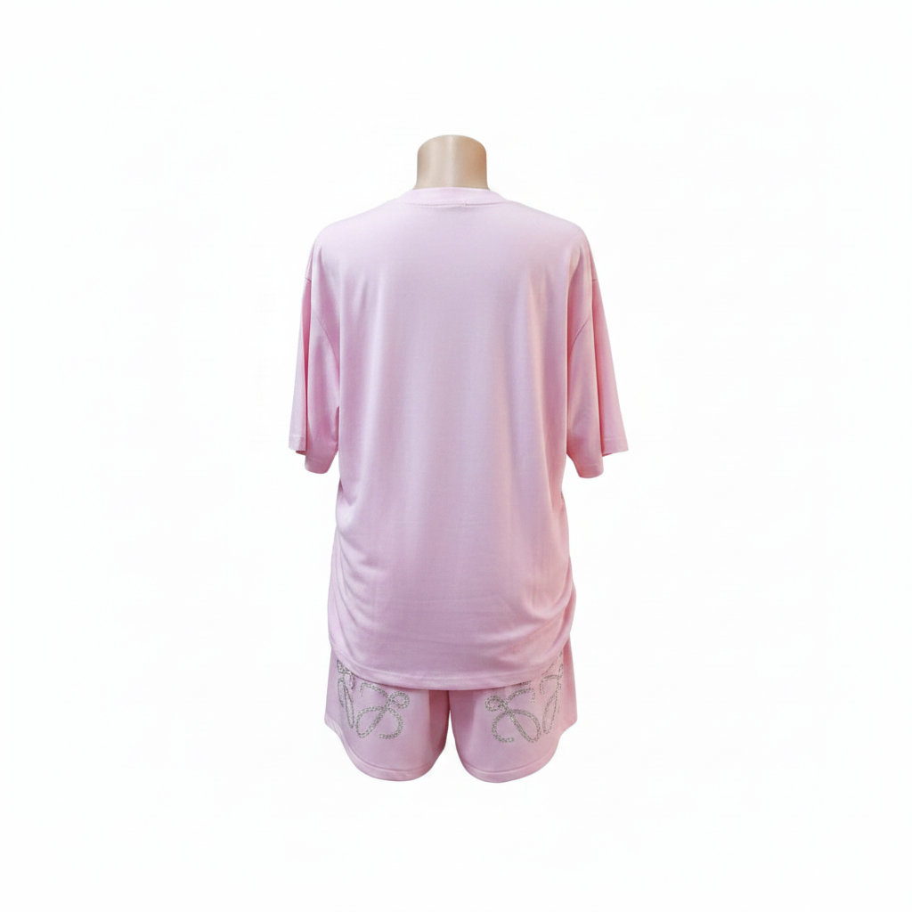 Ghost mannequin back view - pink rhinestone top and shorts set