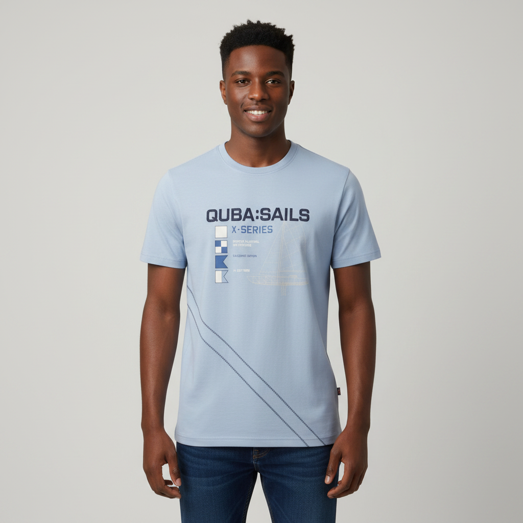 Young Nigerian male wearing steel blue Quba Sails X-Series nautical graphic crew neck tee