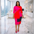 Nigerian female model in corporate office setting wearing Women's Hot Pink & Red Geometric Colour-Block 3/4 Sleeve Bodycon Midi Dress