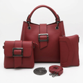 Burgundy three-piece buckle-detail bag set with coordinating strap and chain on white