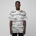 Black Nigerian male model wearing the black-and-white striped round-neck shirt
