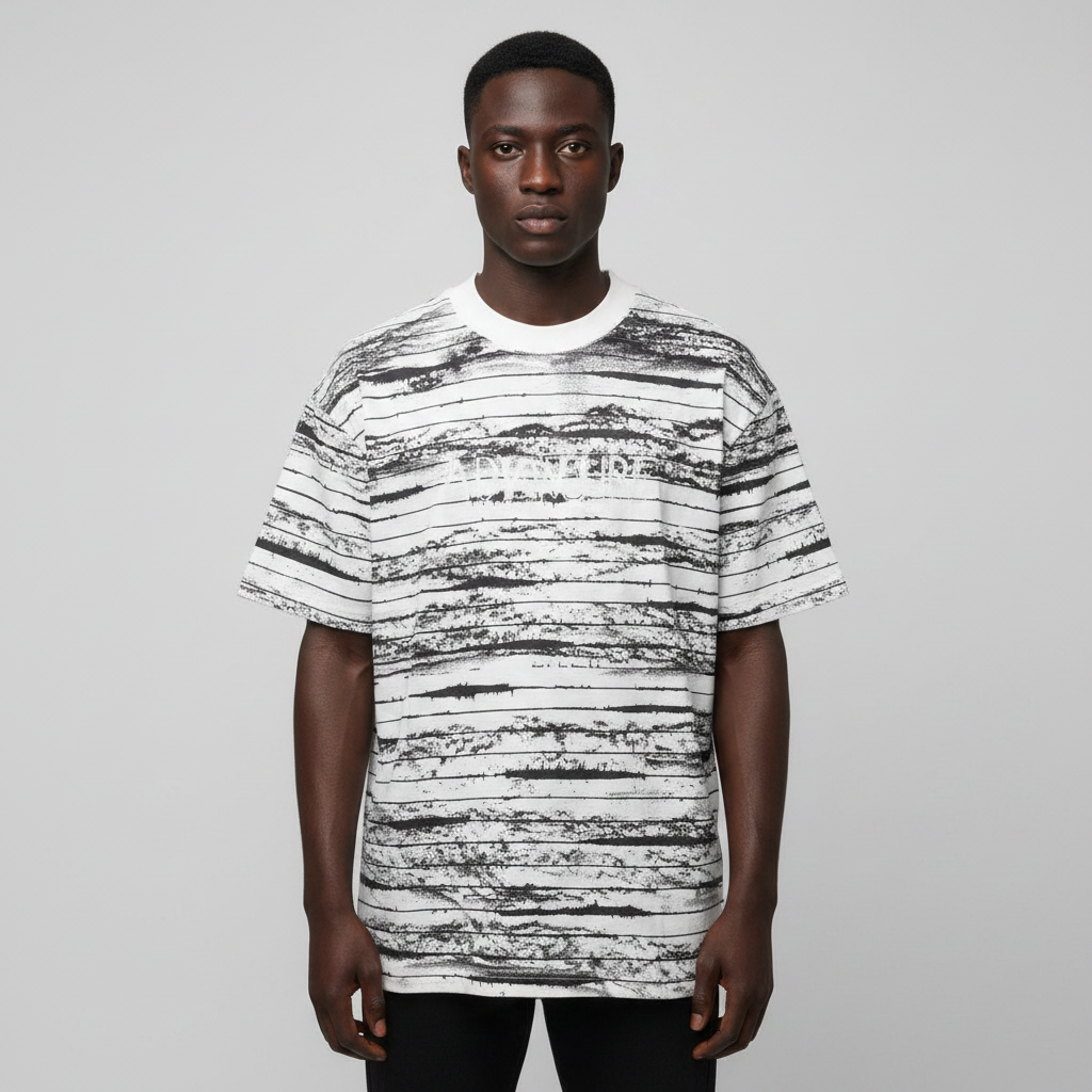 Black Nigerian male model wearing the black-and-white striped round-neck shirt
