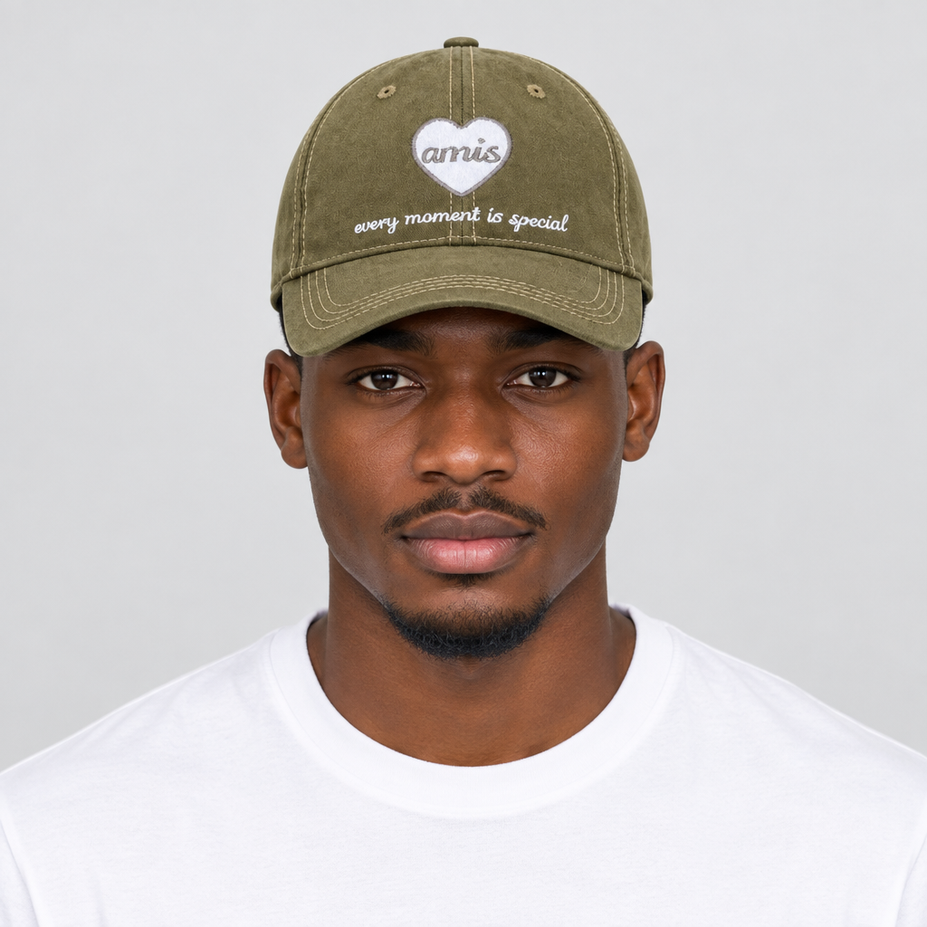 Model wearing unisex olive green heart patch baseball cap