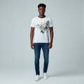 Young Nigerian male wearing white Artizano botanical graphic slim fit tee