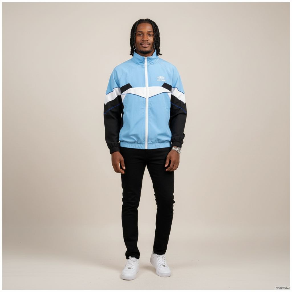 Model wearing the light blue and black colourblock track jacket