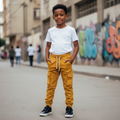 Young Nigerian boy wearing mustard yellow cargo jogger pants