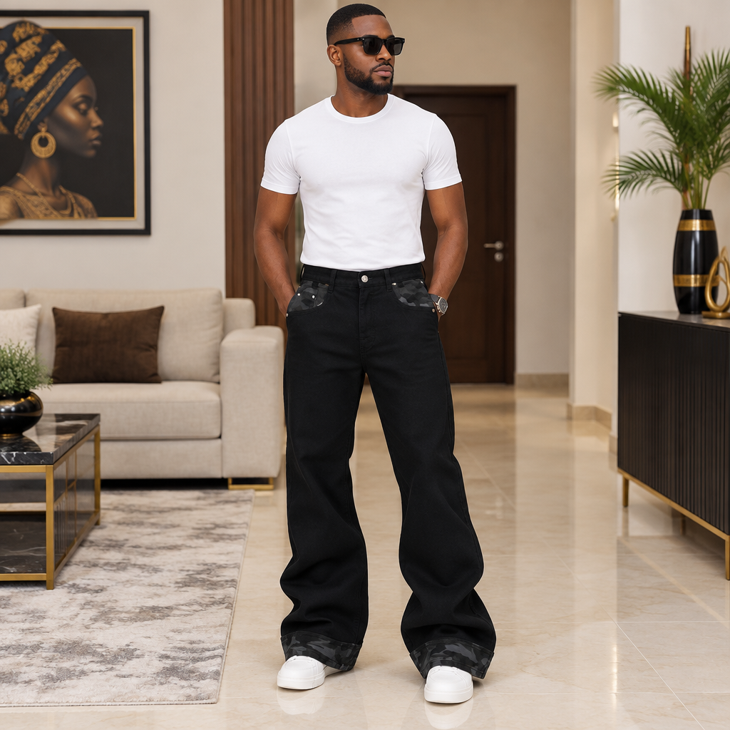 Man wearing black flare trousers with dark camouflage trim
