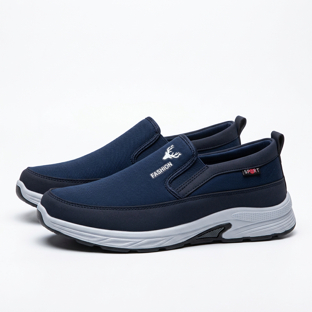 Navy contrast-sole slip-on shoes, pair on a white background
