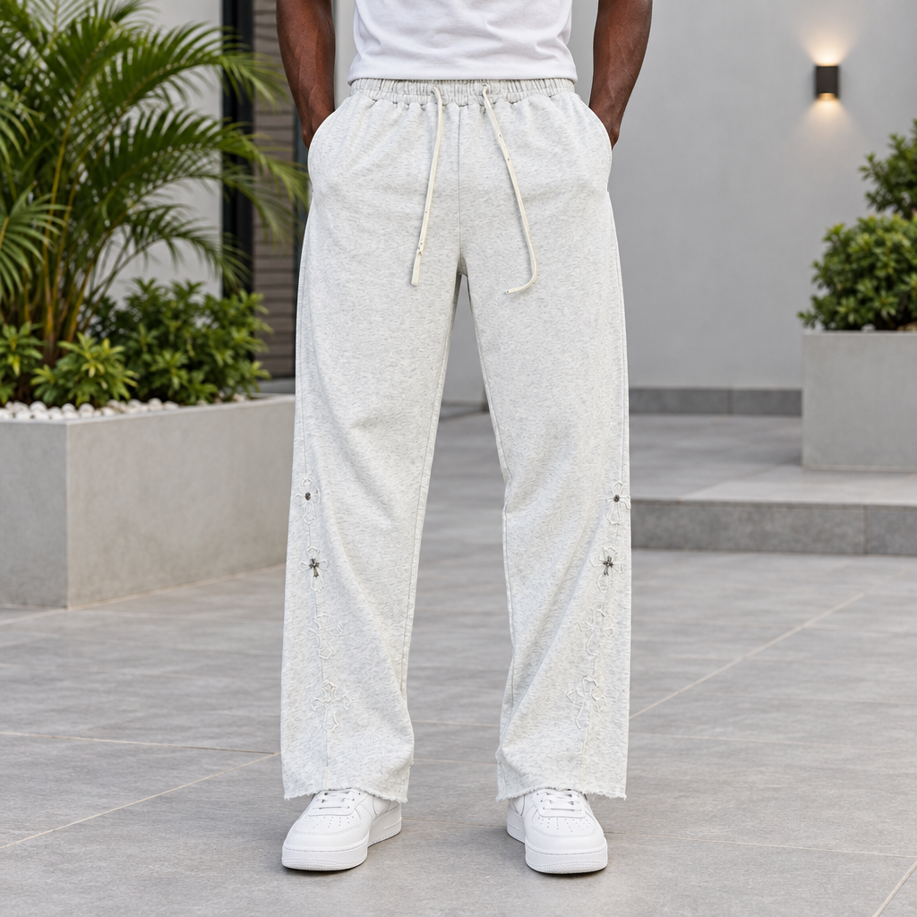 Men's off-white embroidered jogger trousers on Black Nigerian model