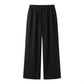 Black wide-leg drawstring trousers with open hems and small horizontal front details