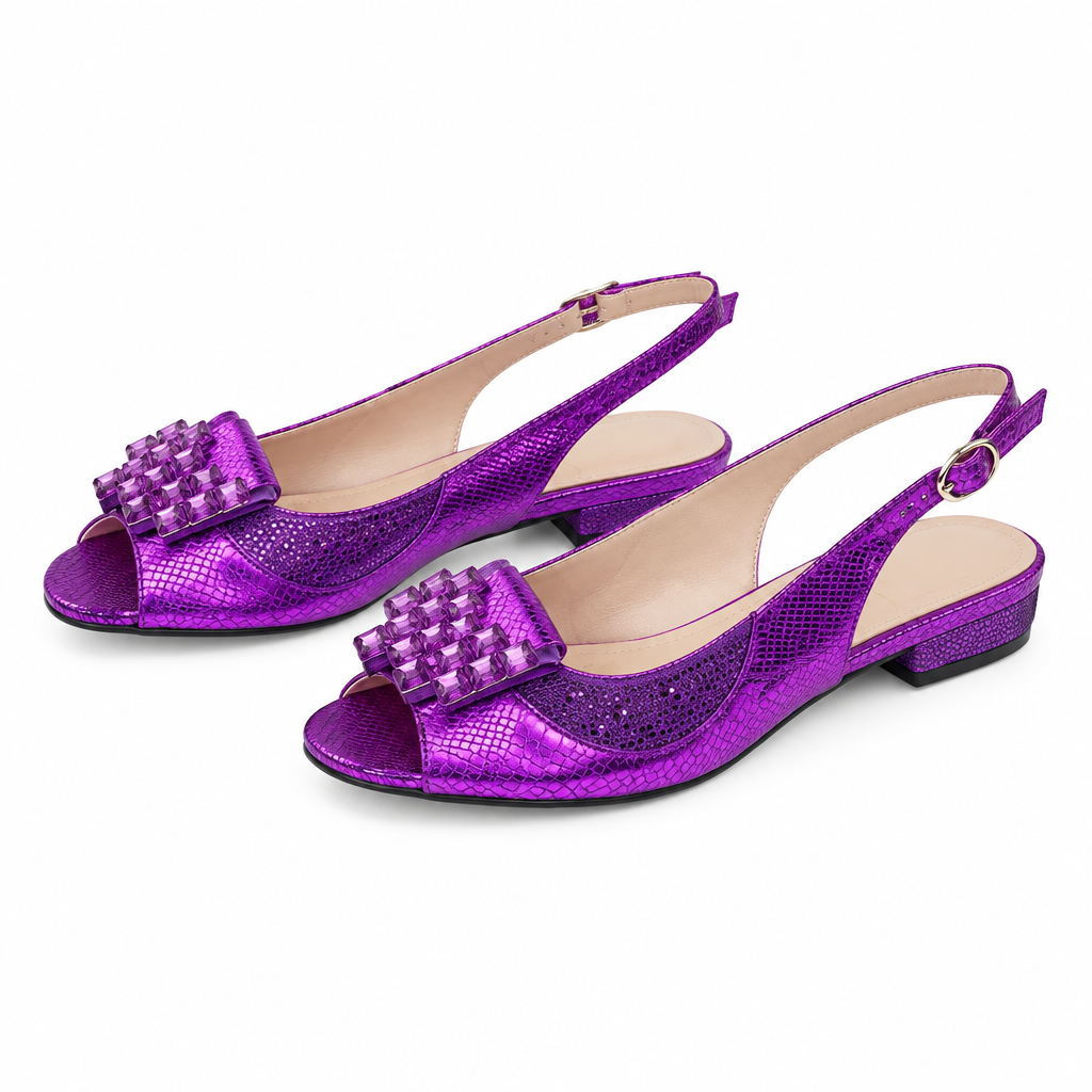 Purple slingback flats pair on white background