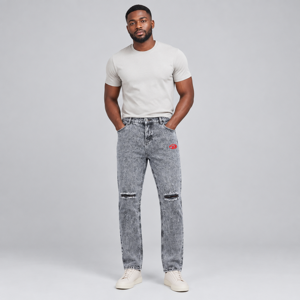 Black Nigerian man wearing light grey lip-patch distressed jeans