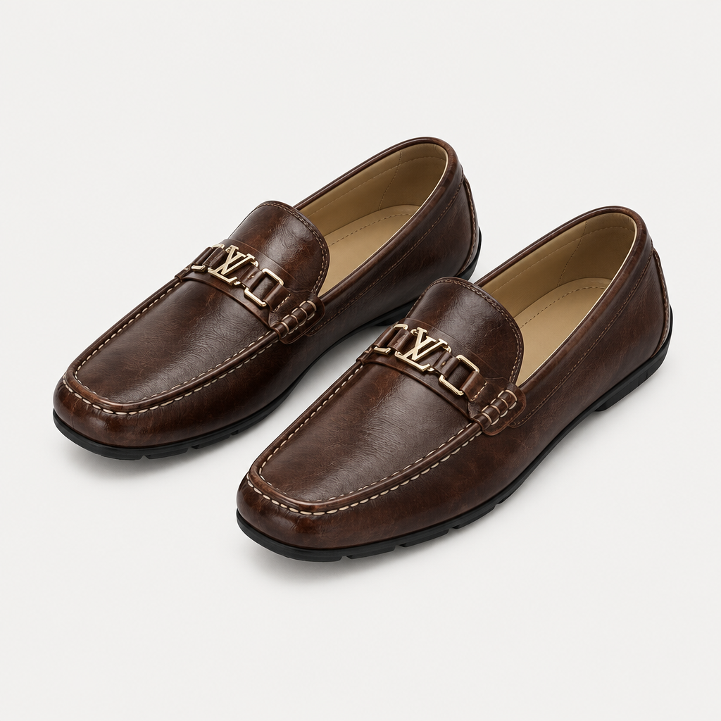 Dark brown men's loafers with polished metal detail shown as a complete pair