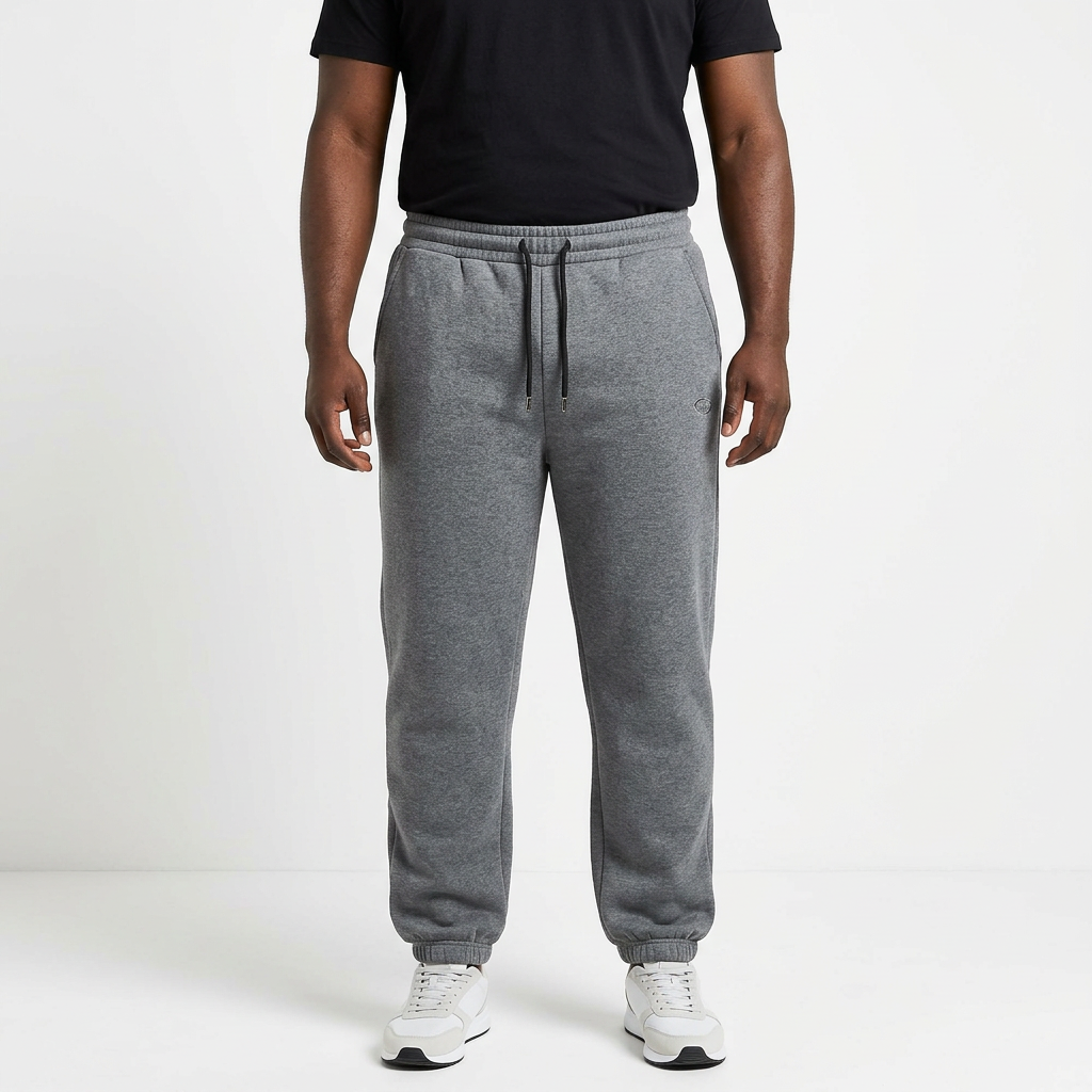 Adult Black model wearing grey marl cuffed drawstring joggers