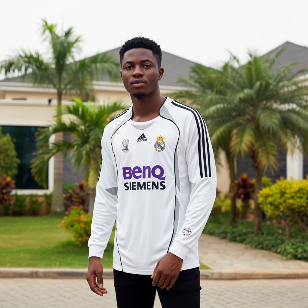 White and grey panel long-sleeve retro football jersey — Nigerian male model front view