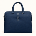 Navy blue textured top-handle bag with contrast stitching