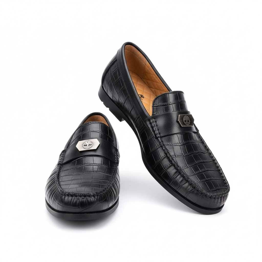 Men's black croc-embossed medallion loafer pair ghost mannequin view