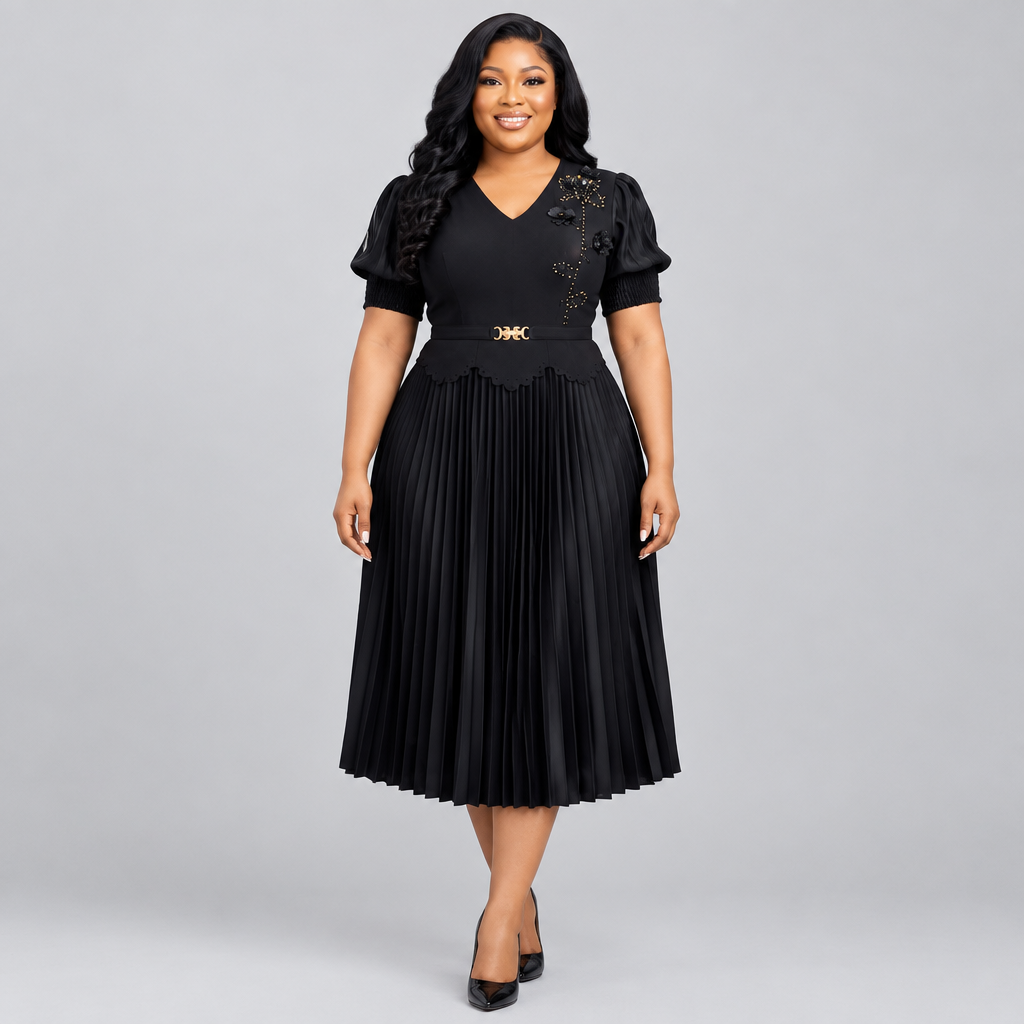 Model wearing black pleated gown