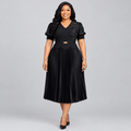 Model wearing black pleated gown