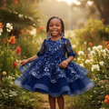 Young Nigerian girl wearing navy sequin tiered tulle sleeve party dress