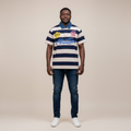 Model wearing the navy and cream striped rugby polo shirt with jeans
