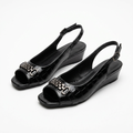Black croc-effect chain-detail slingback wedge pair