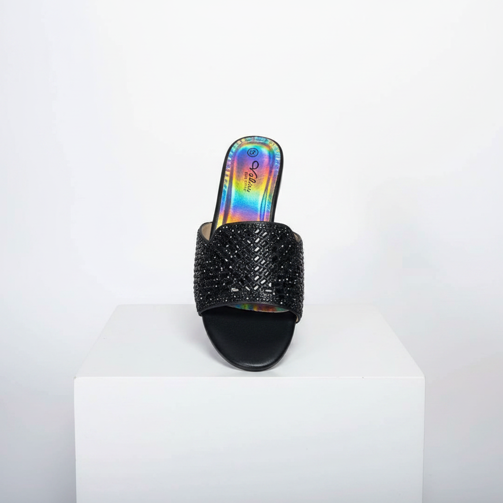 Black diamond rhinestone flat mule slide on white platform – studio shot