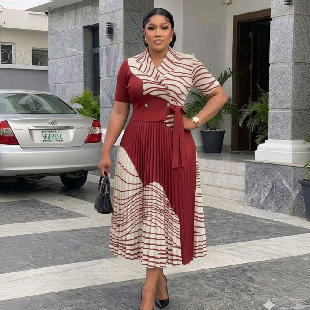 Women's burgundy colour-block striped pleated midi gown – Nigerian model lifestyle shot